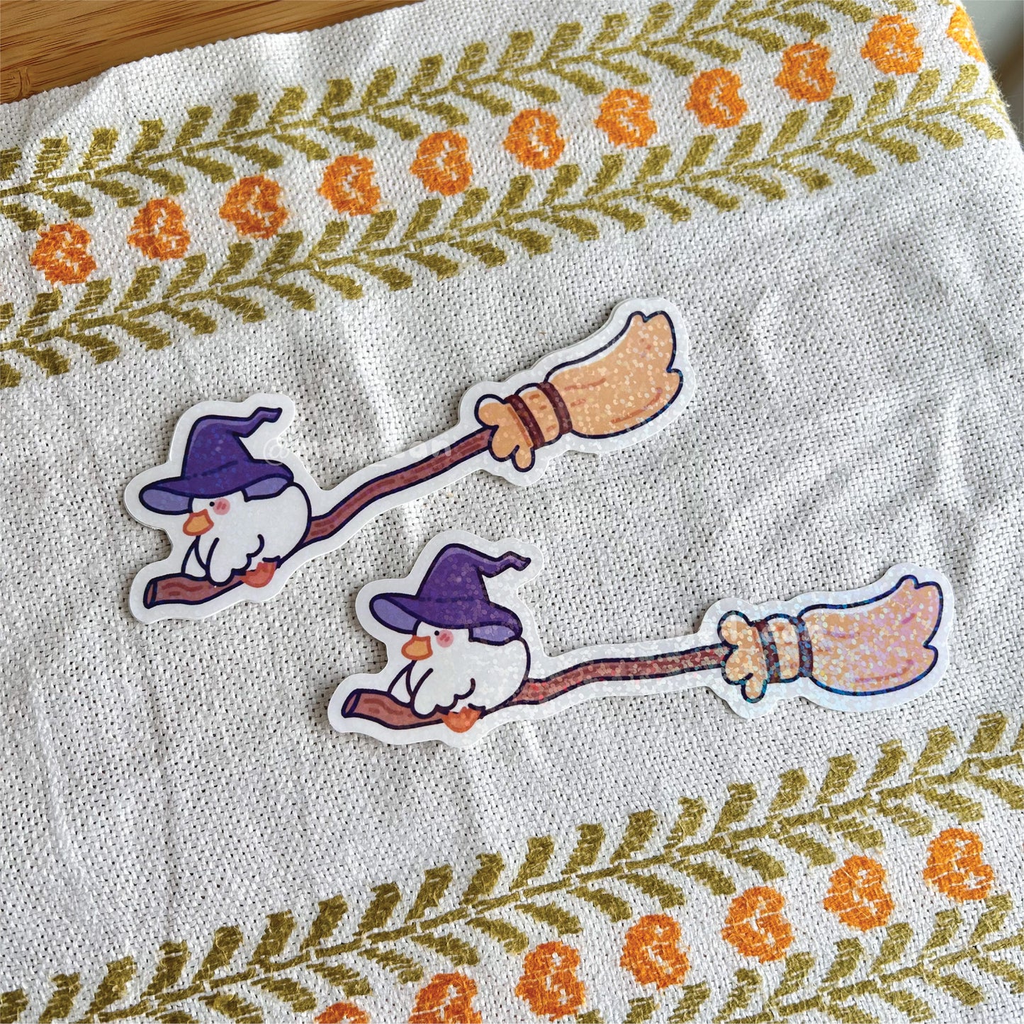 Witch Duck Flying on a Broomstick - Halloween Duck Holographic Die Cut Sticker
